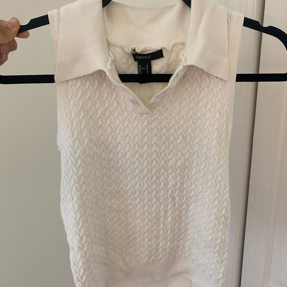 White sweater vest